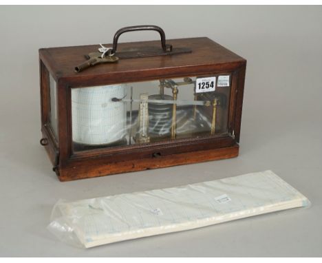 A late 19th century mahogany cased aneroid barometer, with compendium thermometer, unsigned, 28cm wide, (key). 
