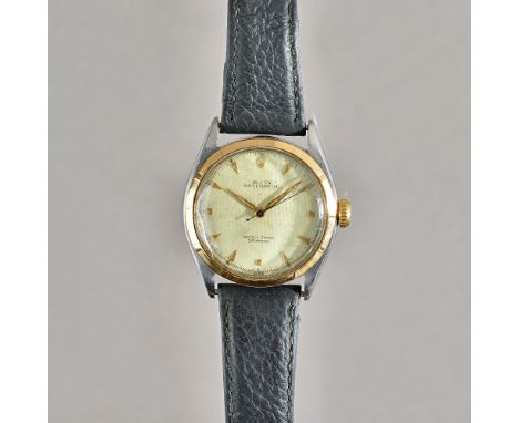 A Rolex Oyster Perpetual steel and gold cased gentleman's wristwatch, the signed silvered dial with gilt arrow shaped numeral