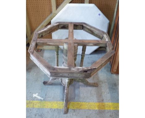 An early 20th century pine octagonal centre table white marble top 75cm wide x 73cm high, (a.f.).   Provenance; property from