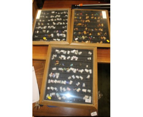 THREE CABINETS OF THIMBLES TO INCLUDE ROYAL WORCESTER, WEDGWOOD, POLISHED HORN, TREEN ETC.