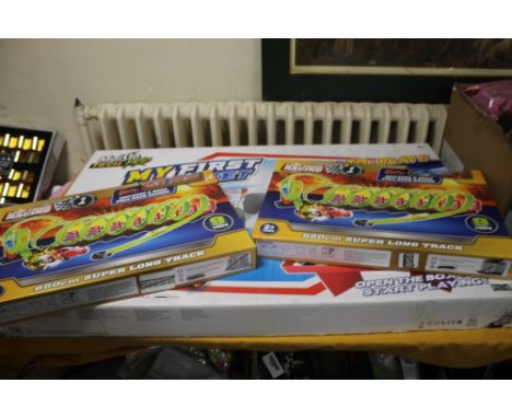 A BOXED MAISTO 'MY FIRST SLOT SET' TOGETHER WITH TWO 'LOOP TRACK RACING SETS'  A/F