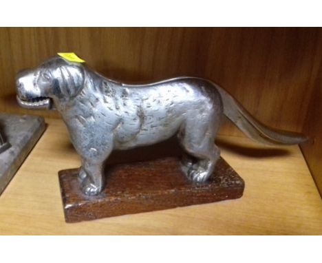 A NOVELTY NUTCRACKER IN THE FORM OF A DOG