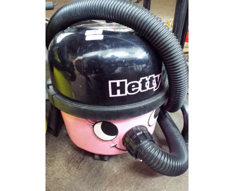 A pink Hetty, Henry style hoover, tools but no brush 