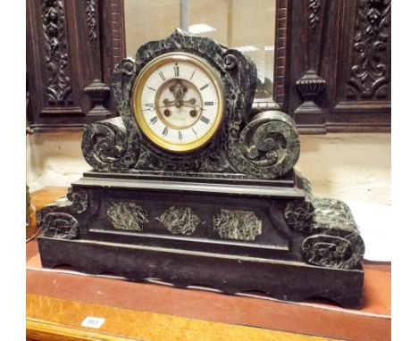 A large Victorian striking mantel clock in green flecked marble case , 23" wide X 17.5" tall 