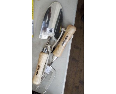 A new stainless steel trowel and hand fork 