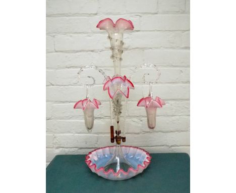 Victorian pink and white opaque glass five branch epergne, 23 " tall  As photograph shows there is a replacement inserted in 
