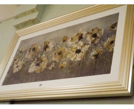 A large silver framed print of poppies 