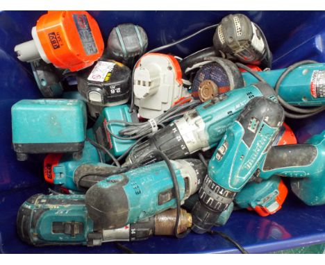 A large quantity of cordless Makita drills, chargers, batteries and electric 4.5" angle grinder, some working