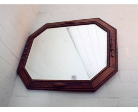 A 1930's cushion shaped wall mirror 
