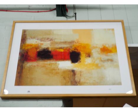 A large modern abstract poster print in light oak frame 