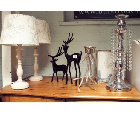 A plated lustre candlestick, a pair of cream table lamps with shades, antler ornaments, deer figures, Voyage game bird lamp s