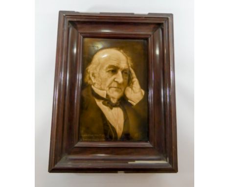 A Sherwin & Cotton portrait tile of William Gladstone from a portrait by S Mendelssohn in a rosewood style frame, tile measur