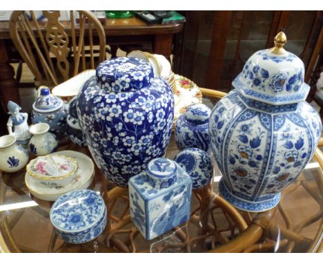 A collection of blue and white porcelain, ginger jars, tea caddy and the remnants of an Old Country Roses Royal Albert dinner