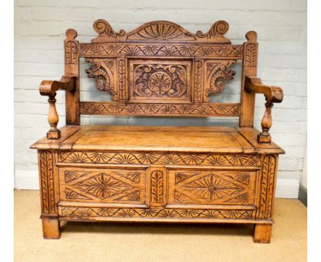 Late Victorian light oak carved monks bench hall seat, 3'6" wide