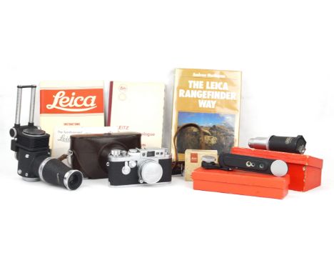 A Leica III G camera 1957Number 879834, with Elmar 50F 2.8 lens, number 1617806 and cap, complete with leather case, together