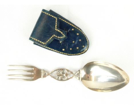 A continental silver folding spoonThe central Fleur-de-lys with a hinged fork and spoon at either end, stamped 800, to a leat