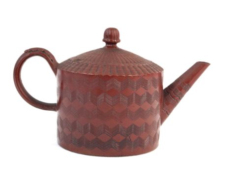 An 18th Century English Redware teapot In the Chinese taste , having incised geometric decoration, impressed Chinese mark to 