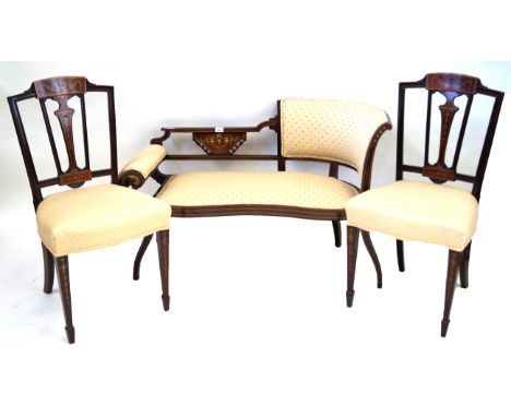An elegant Edwardian 'Sheraton Revival' marquetry inlaid two seater sofa, and pair of matched chairsThe sofa of ornate form, 