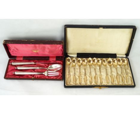 A set of twelve Danish silver-gilt teaspoonsWith plaited and panelled stems, cased, bearing the three tower mark, possibly 19