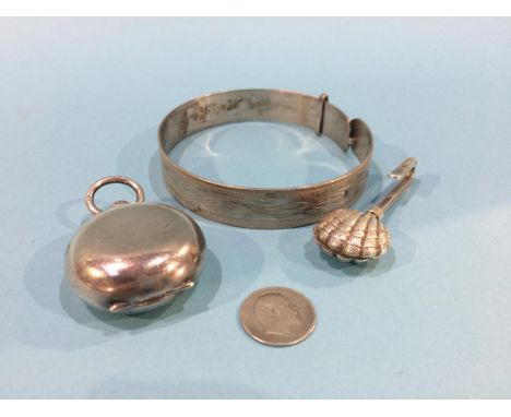 A silver bangle and a sovereign case etc.