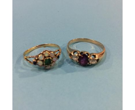 An opal and emerald ring and a diamond and amethyst ring, marked 15ct