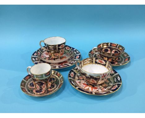 Four Royal Crown Derby Imari pattern cups and saucers