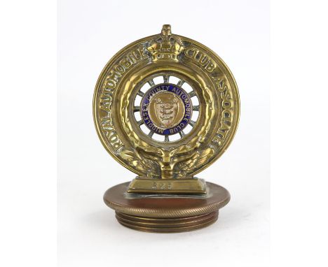 Vintage brass Royal Automobile Club Associate Middlesex County  Club badge numbered B25.Please note this lot has the standard