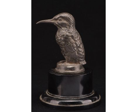 Vintage Woodpecker brass car mascot mounted on a plastic base. 18cms tall. Please note this lot has the standard Ewbank's sta