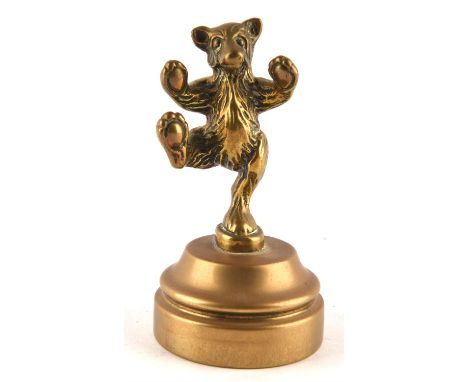 Vintage dancing bear brass car mascot.  9cms tall. Please note this lot has the standard Ewbank's standard buyers premium pay