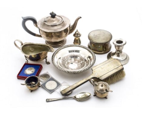 An Art Deco silver hair brush and powder box, AF, together with a silver filled dwarf candleholder, a three piece silver plat