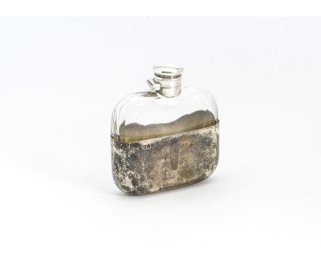 An Edwardian glass and silver capped hip flask by James Dixon &amp; Sons, together with a slightly later silver hipflask base