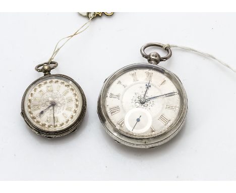 A late Victorian silver open faced lady's and a gentleman's pocket watch, both having silver coloured engraved dials heighten