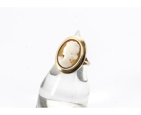 A 9ct gold cameo dress ring, the oval carved panel with a portrait of a young girl on yellow gold shank marked 375, ring size