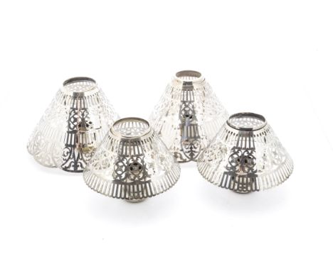 A set of five vintage silver plated pierced table lamp shades, with silver plated stands, three marked Miller &amp; Sons, tog