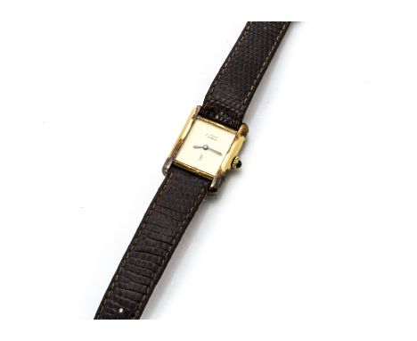 A c1980s Must de Cartier silver gilt lady's wristwatch, 20mm case, appears to run, on brown Must de Cartier strap 