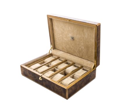 A modern walnut watch box from Dal Negro, 30cm by 20cm, opening to reveal pads for ten watchesfew light scratches to the outs