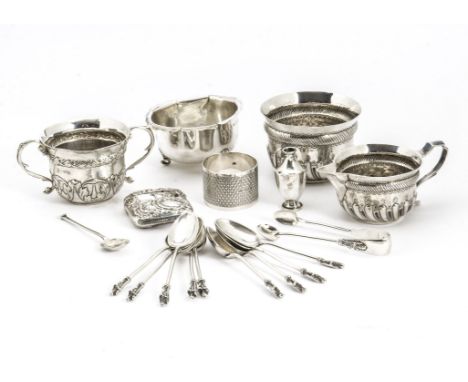 A collection of Victorian and later silver, including a twin handled Christening beaker with George III three pence inset to 