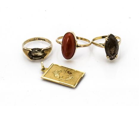 A continental yellow metal and coral dress ring, ring size W, 3.3g together with two 9ct gold smoky quartz dress rings, ring 