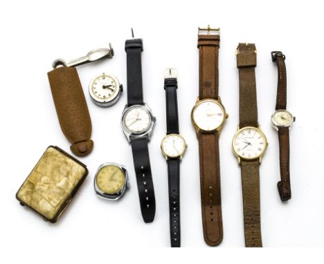 Seven watches, including a mid-sized Rigi, a Tressa, and others, also a matchbox holder and a pipe smokers tool in pouch 