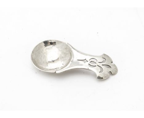 An Arts &amp; Crafts style tea caddy spoon, having hammered silver circular bowl and shaped and pierced handle, unmarked 