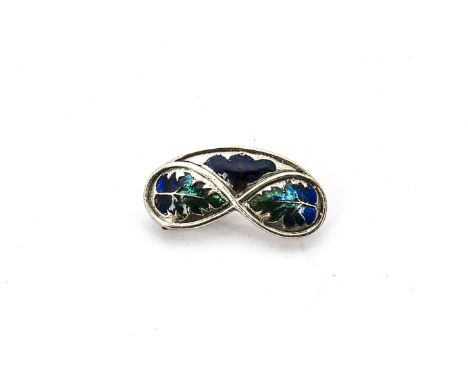 A Liberty &amp; Co cymric silver and enamel knot brooch, the three silver and enamel panels decorated in blue and green tones