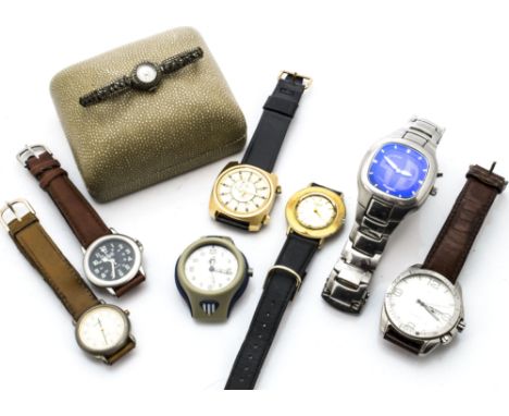 A collection of vintage and modern wristwatches, including two Fossil examples, and others such as Casio, Sekonda, Quicksilve