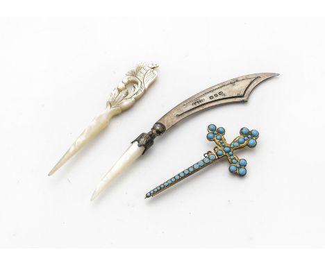 A late Victorian silver and mother of pearl dagger shaped book mark, together with a French gilt and turquoise pin in the for