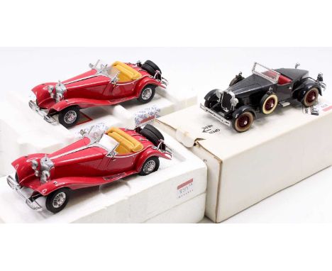 A Franlin Mint 1/24 scale polystyrene packed and boxed diecast group, to include a 1935 Mercedes Benz 500K, together with one