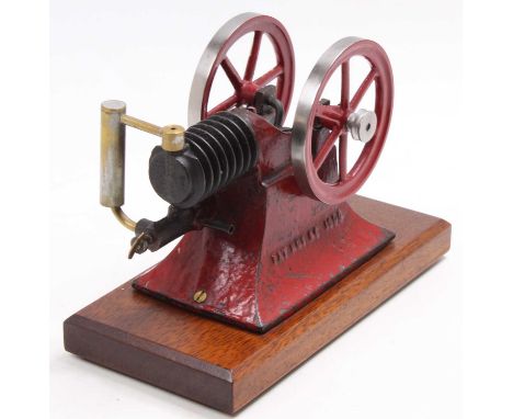 An American circa 1900 horizontal Paradox model gas engine, handpainted in red, free running example, with single horizontal 