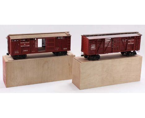 Two scratch-built G scale stock cars, each on two 4-wheel bogies, all metal slatted sides, oxide colour with white lettering,