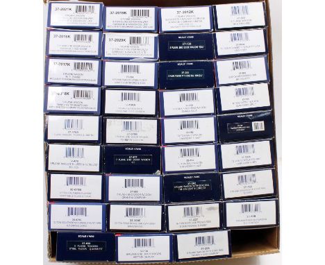 Thirty-five Bachmann Branchline 4-wheel goods wagons, a varied selection with a few duplicates, as new (NM) but a few boxes s
