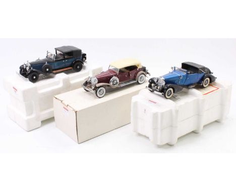 A collection of three Franklin Mint 1/24 scale diecast vehicles all housed in original cardboard or polystyrene packaging, to