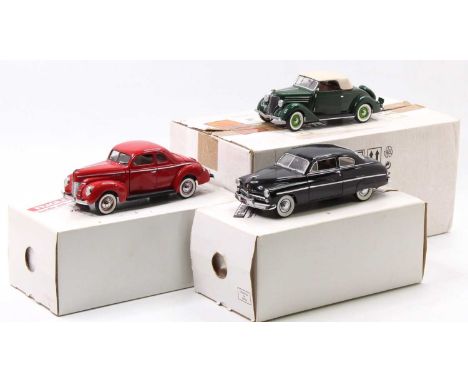 A Franklin Mint 1/24 scale boxed diecast group to include a 1949 Mercury Club Coupe, together with a 1944 De Luxe Coupe, and 