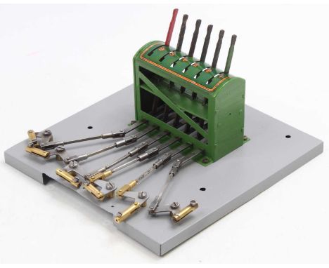 Hornby 0-gauge 6-lever control frame. Totally refurbished and repainted. Grey base, green frame, one green one red and four b